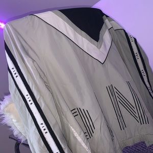 Grey,black, and white windbreaker